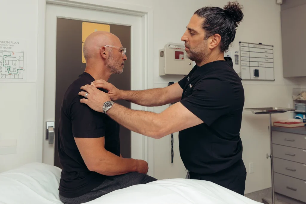 Dr. Samimi with a patient
